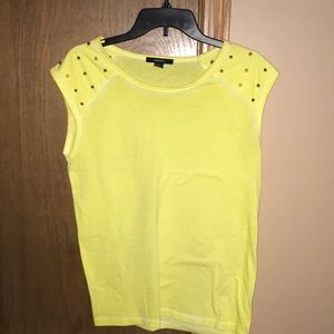 Yellow shirt with spikes in the shoulders